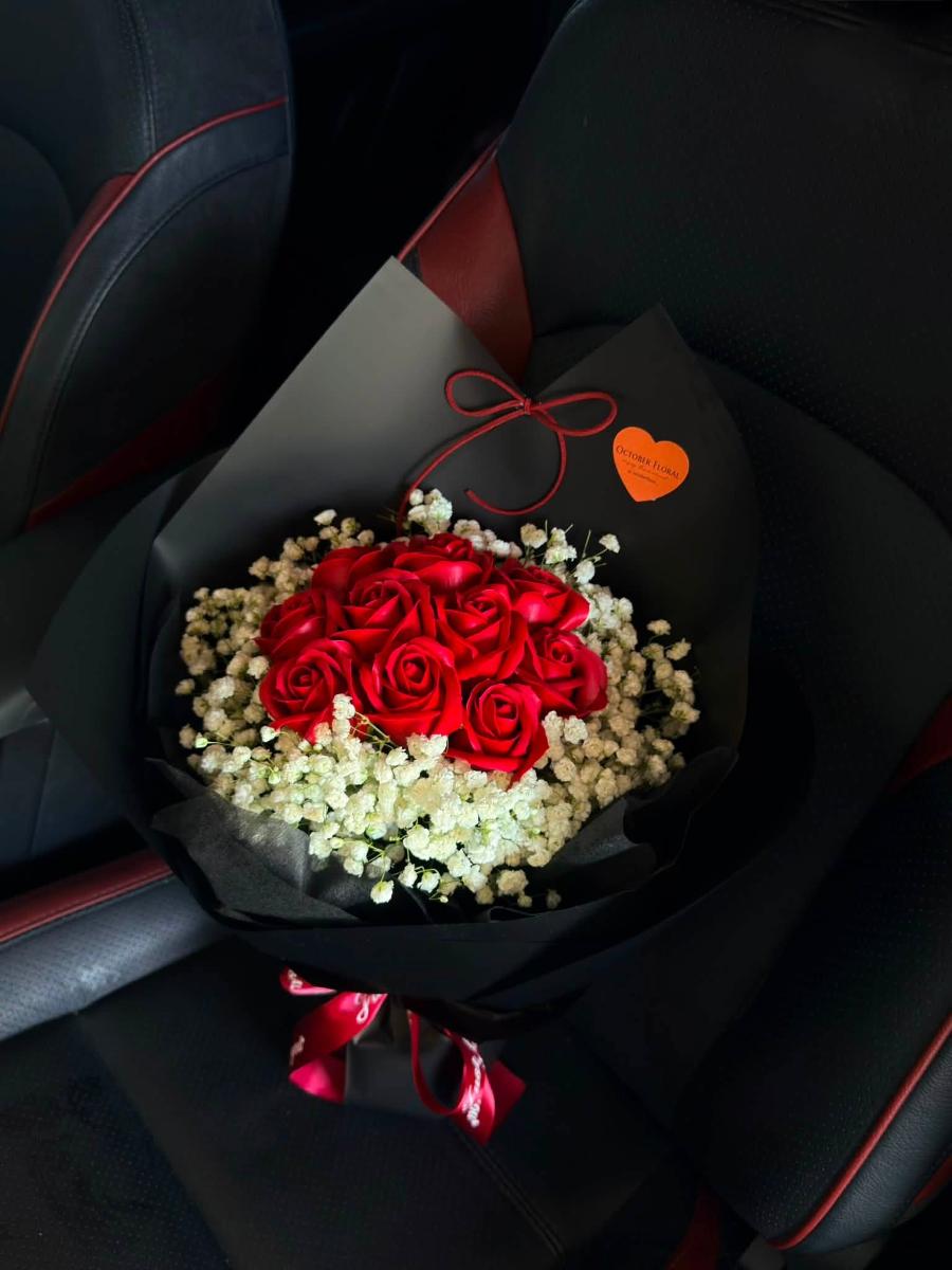Classic Red Roses with Baby's Breath in Black Wrap
