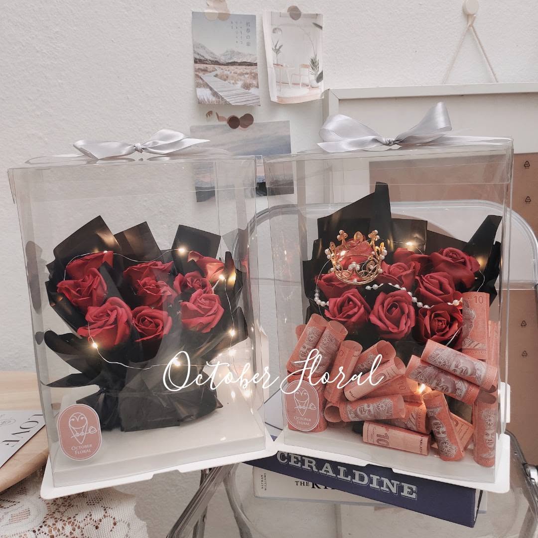 Dark Elegance - Two Styles of Clear Display Gift Boxes in Black Packaging with Red Roses, Fairy Lights, and Crown Banknote Arrangements
