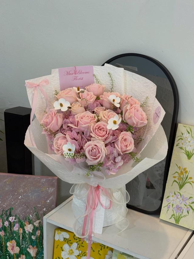 Pink plastic colour roses & hydrangeas