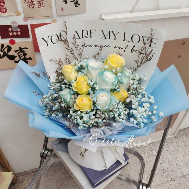 Ocean of Love - Blue & Yellow Rose Hand Bouquet with English Wrap