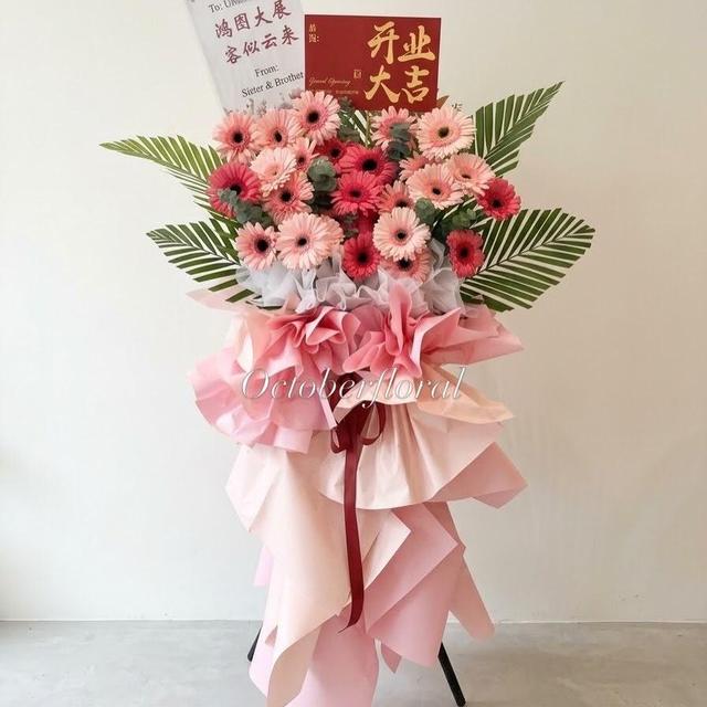 Grand Opening - Large Standing Pink Gerbera Flower Stand Featuring Multi-Layer Pink Packaging